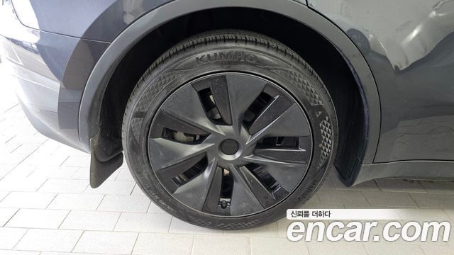 Tesla Model Y RWD — пробег 40 030 км — фото 5 из 5