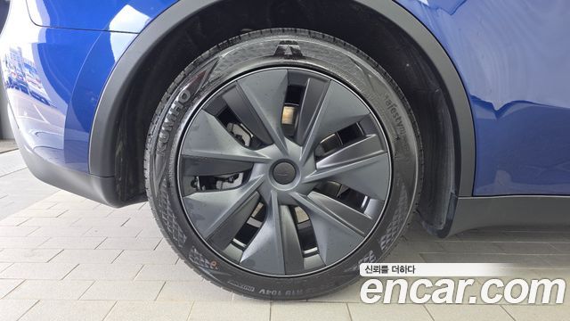 Tesla Model Y RWD — пробег 35 555 км — фото 5 из 5