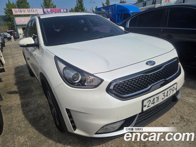 Kia Niro Prestige — пробег 74 391 км — фото 3 из 5